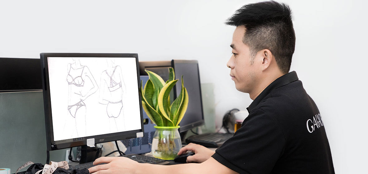 A designer is drawing sexy lingerie on the computer
